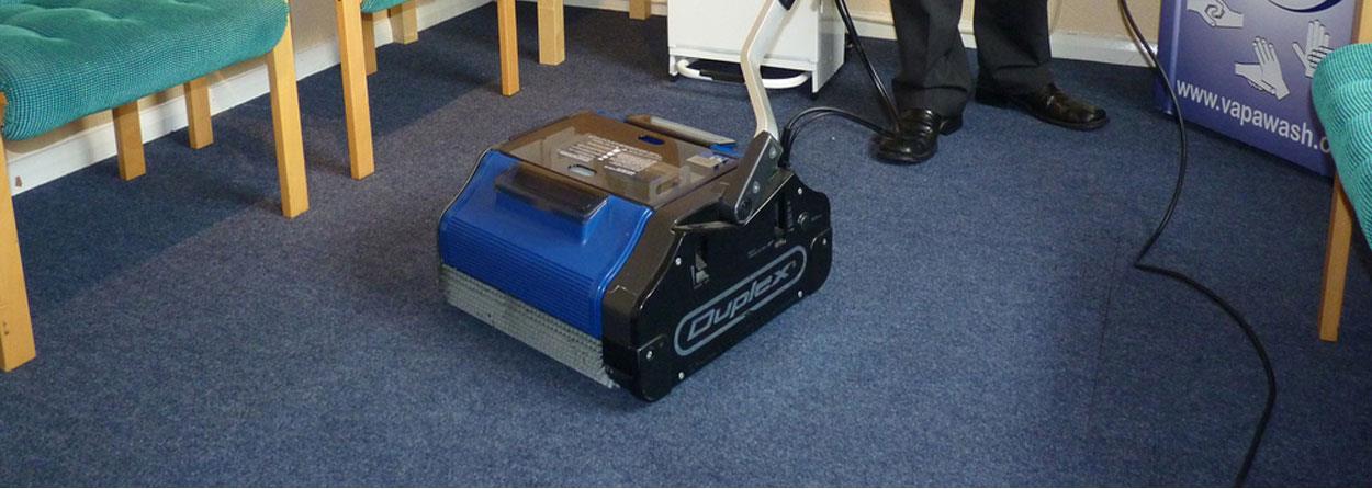 Duplex 420 steam floor scrubber performing encapsulation carpet cleaning in a Canberra commercial space