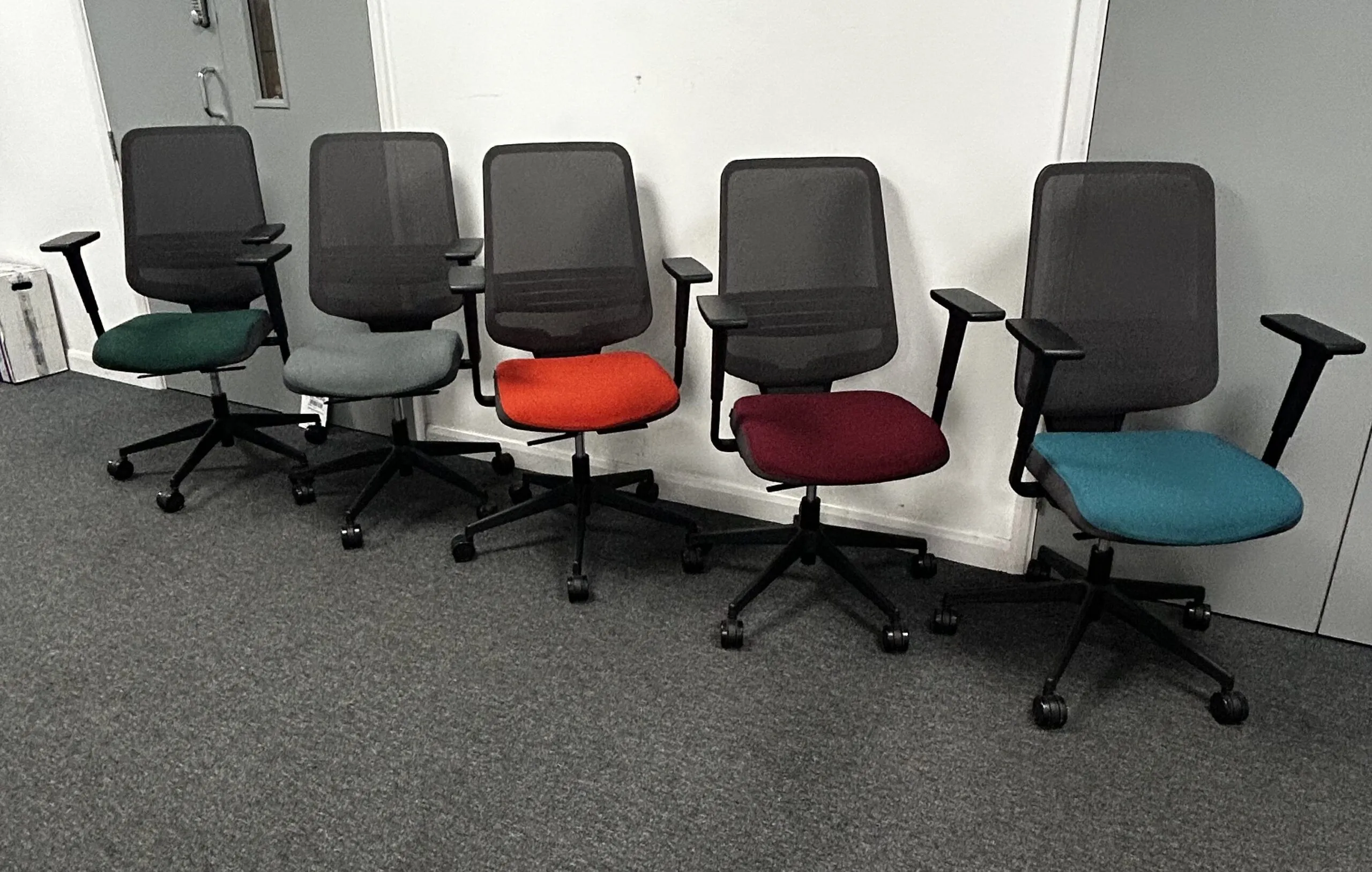 Fabric office chairs being professionally cleaned by commercial cleaners in Canberra